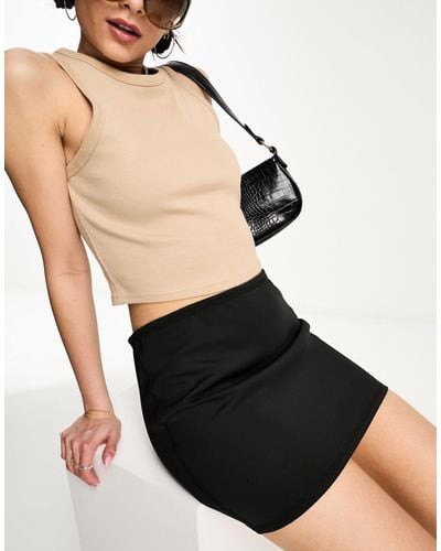 Weekday Mini-jupe minimaliste en néoprène - Noir