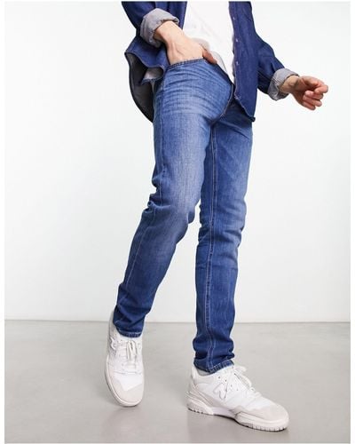 Lee Jeans Luke - jean slim coupe ajustée délavage vintage moyen - Bleu