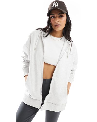 ASOS Sudadera extragrande color hielo jaspeado con capucha, logo y cremallera completa - Negro