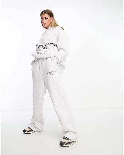 ASOS Joggers extragrandes con logo apilado - Blanco