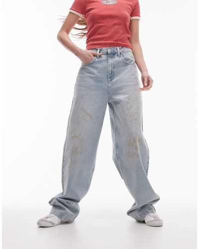 TOPSHOP – sonnengebleichte baggy-jeans mit schlammflecken und hohem bund - Blau