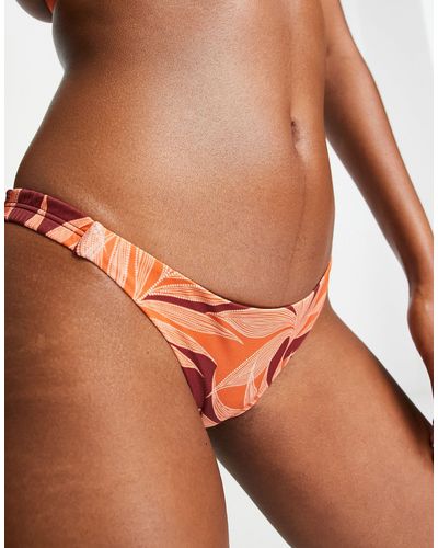 Accessorize Slip bikini tanga con stampa tropicale - Marrone