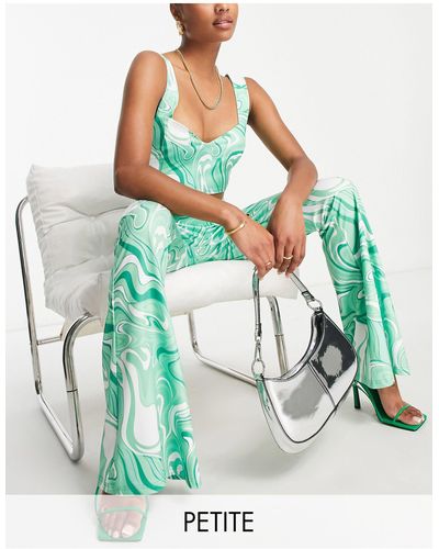 Collective The Label Pantalones verdes con estampado ondulado exclusivos