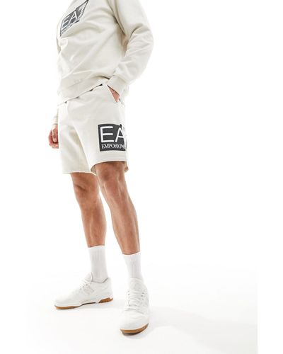 EA7 Armani - - pantaloncini della tuta beige con logo laterale grande - Bianco
