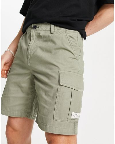 New Look Pantaloncini cargo slim kaki - Verde