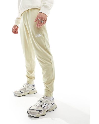 The North Face Training Reaxion Logo joggers - White