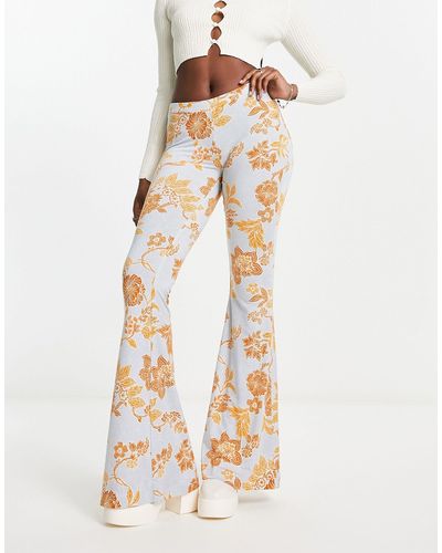 Free People Bloom Floral Slinky Flared Trousers - Natural