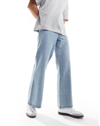 ASOS Jeans a zampa a fondo ampio lavaggio medio - Blu