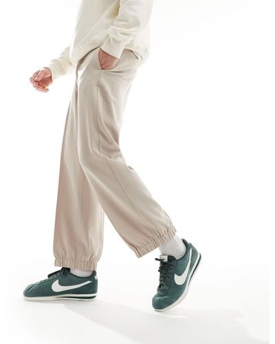 ASOS – elegante jogginghose mit weitem schnitt - Weiß