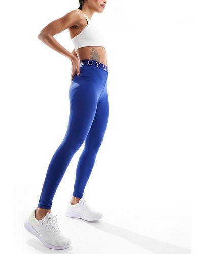 Gym King Impact - legging avec bande à logo - bleu