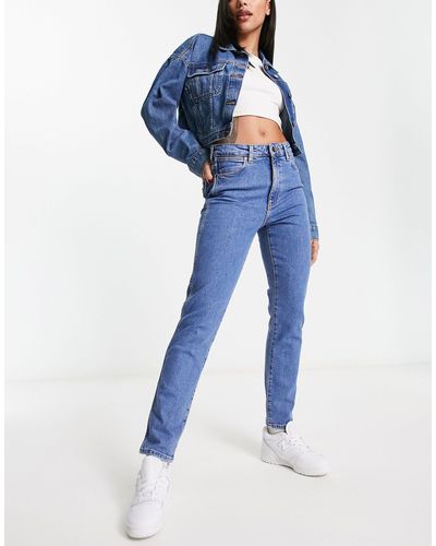Wrangler Jean skinny taille haute - délavé moyen - Bleu