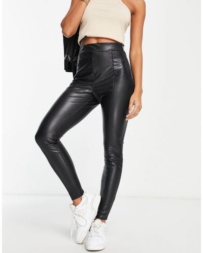 River Island Pantalon legging skinny zippé en similicuir - Noir