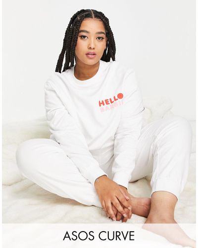 ASOS Asos design curve – barbie x hello kitty – lounge-set aus sweatshirt und jogginghose - Weiß