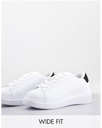 Truffle Collection Zapatillas deportivas blancas con talonera negra y suela gruesa - Blanco
