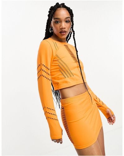 ONLY Mini-jupe d'ensemble sans coutures à découpes - Orange