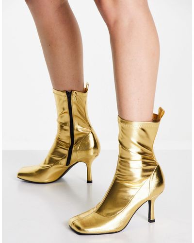 ASOS Botas doradas estilo calcetín con tacón y puntera cuadrada roma - Metálico