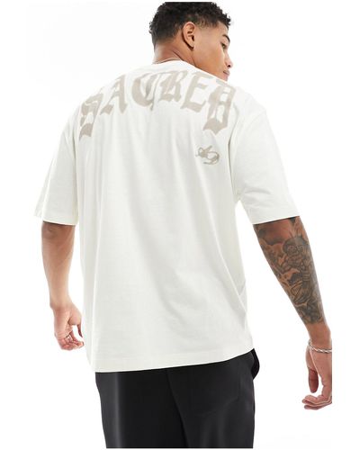 ASOS T-shirt oversize color sporco con scritta stampata sul retro - Bianco