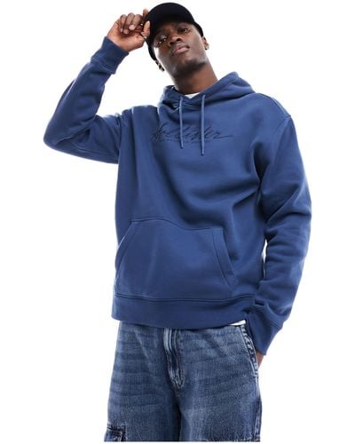 Hollister Relaxed Fit Hoodie With Embroidered Chest Logo - Blue