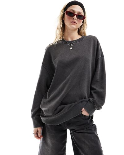 Monki – langärmliges oversize-sweatshirt - Schwarz