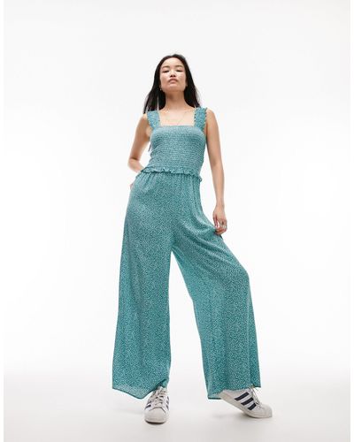 TOPSHOP – geraffter jumpsuit mit blumenprint - Blau