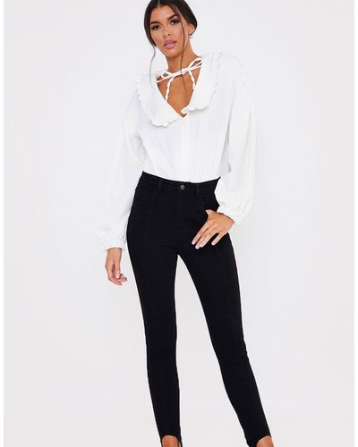In The Style X Lorna Luxe Skinny Denim Jean With Stirrup Detail - Black