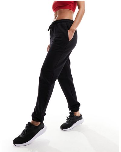 ASOS 4505 – schmal geschnittene sport-jogginghose aus loopback-stoff - Schwarz