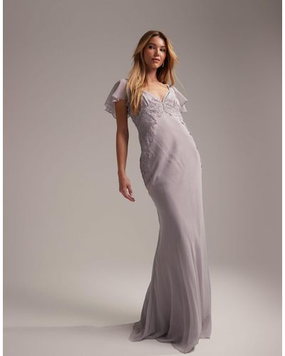 ASOS L'invitée - robe longue à manches évasées avec détails en dentelle et jupe en biais - lilas - Blanc