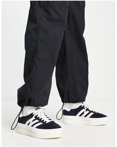 adidas Originals Zapatillas blancas y negras con plataforma gazelle - Negro