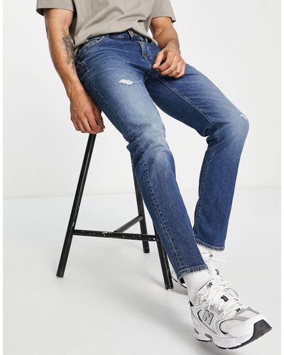 ASOS Smalle Jeans Met Stretch, Scheuren En Donkere Wassing - Blauw