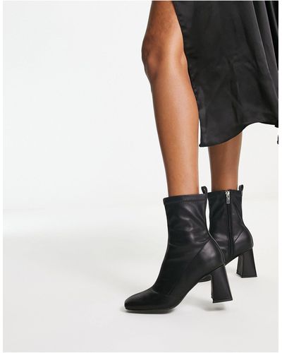 Schuh Bella - stivali a calza neri con tacco - Bianco