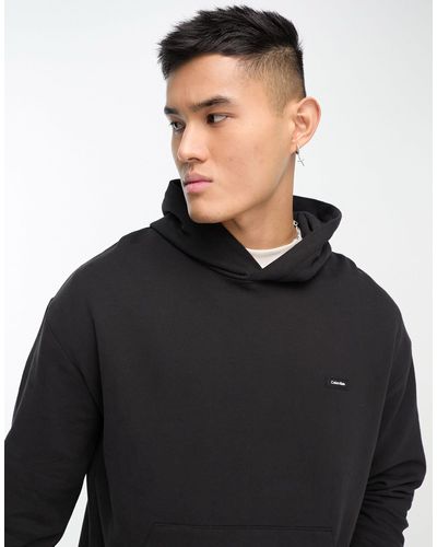 Calvin Klein Sweat à capuche confort à logo encadré - noir