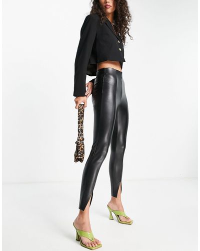 TOPSHOP Pantalon skinny en imitation cuir avec fentes devant - Noir