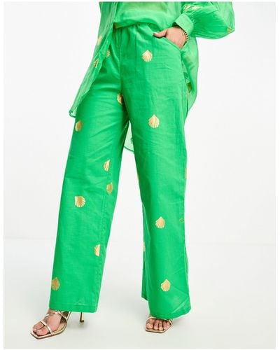 Never Fully Dressed Pantalon d'ensemble ample à coquillages métallisés - Vert
