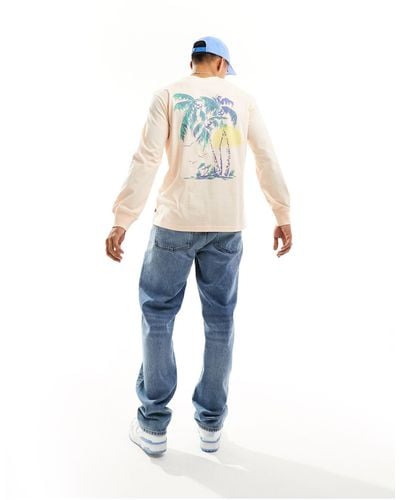 Levi's T-shirt à manches longues avec petit logo et imprimé palmier au dos - Bleu