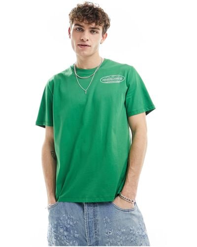 Timberland Camiseta verde con logo reflectante en la espalda