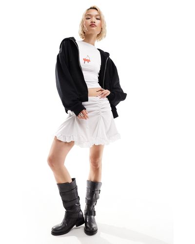 Weekday Suzi - minigonna bianca con dettaglio arricciato e fondo con volant - Nero