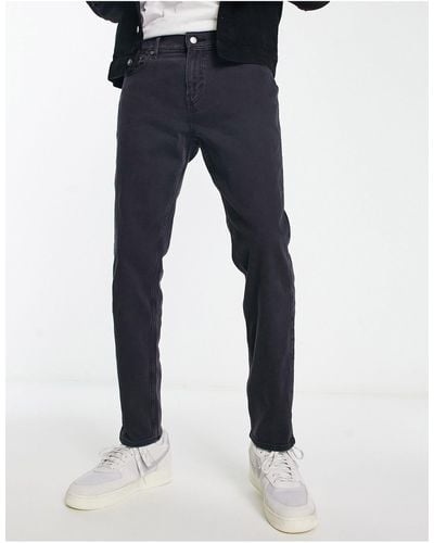 Hollister Jeans slim anni '90 con strappi sulle ginocchia nero slavato - Blu