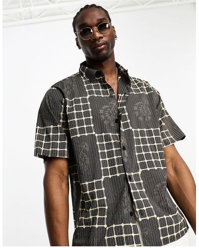 Reclaimed (vintage) Chemise en coton coupe carrée à manches courtes et imprimé patchwork - Noir