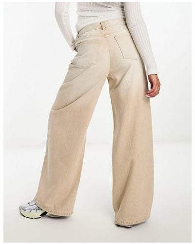 Bershka Jeans con fondo ampio color sabbia slavato - Bianco