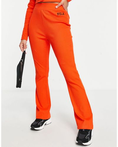 Fila Pantaloni a zampa a coste rossi con logo - Arancione