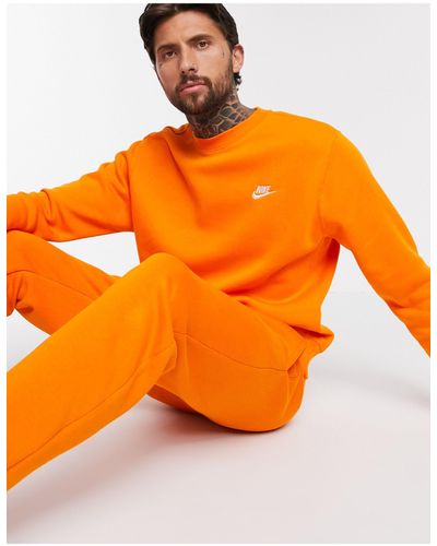Nike – Club – Rundhals-Sweatshirt - Orange