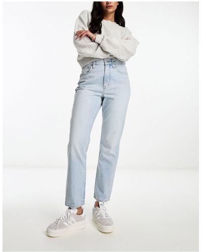 https://cdna.lystit.com/400/500/tr/photos/asos/f7354a13/madewell-Blue-Perfect-Vintage-Jeans.jpeg