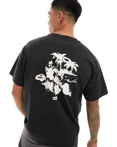 Levi's Camiseta negra con estampado del logo y palmera en la parte central del pecho y la espalda - Negro