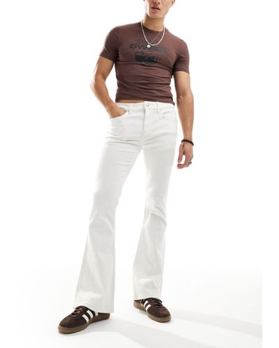ASOS Jeans a zampa elasticizzati écru - Bianco