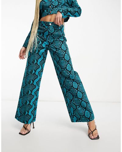 Something New X madeleine pedersen - pantalon d'ensemble large à imprimé serpent - et noir - Bleu