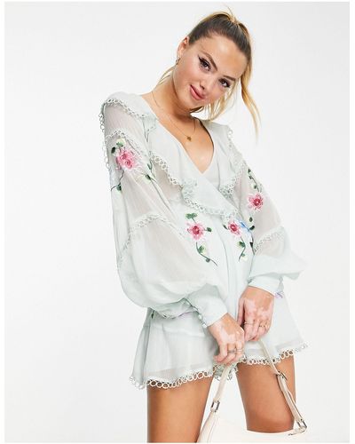 ASOS Embroidered Textured Cut Out Romper With Ruffle Wrap - Blue