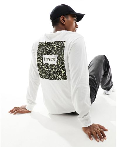 Levi's T-shirt à manches longues avec petit logo centré et imprimé au dos - Blanc