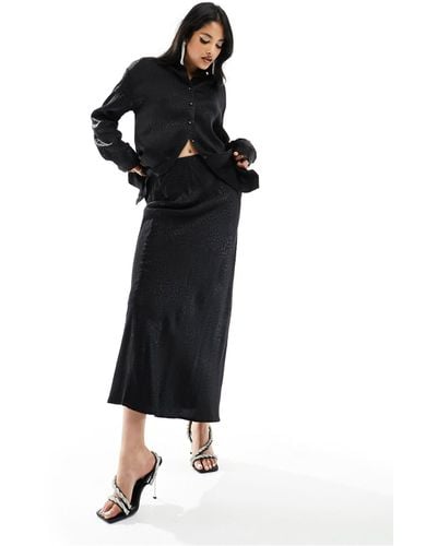 Pimkie Falda larga negra con estampado animal - Negro