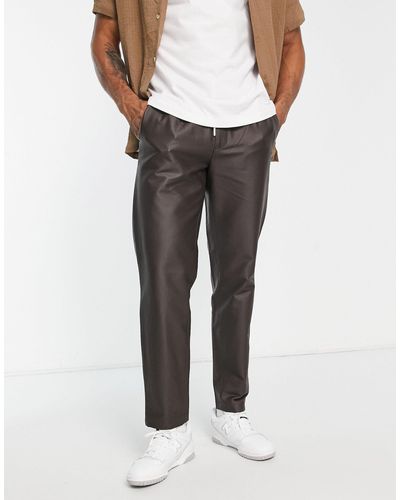 TOPMAN Pantalon ample en imitation cuir - Marron