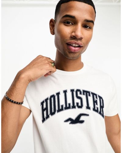 Hollister T-shirt bianca con logo stile college - Bianco